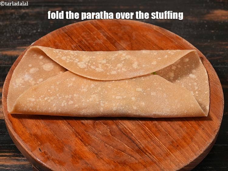 Step 44 – Fold the paratha over the stuffing.