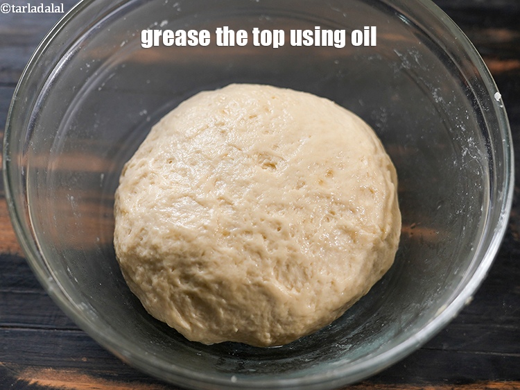 Step 25 – Grease the top using &frac12; tsp oil.