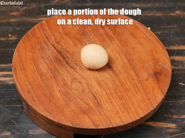 Step 26 – Place a portion of the dough on a clean, dry surface.