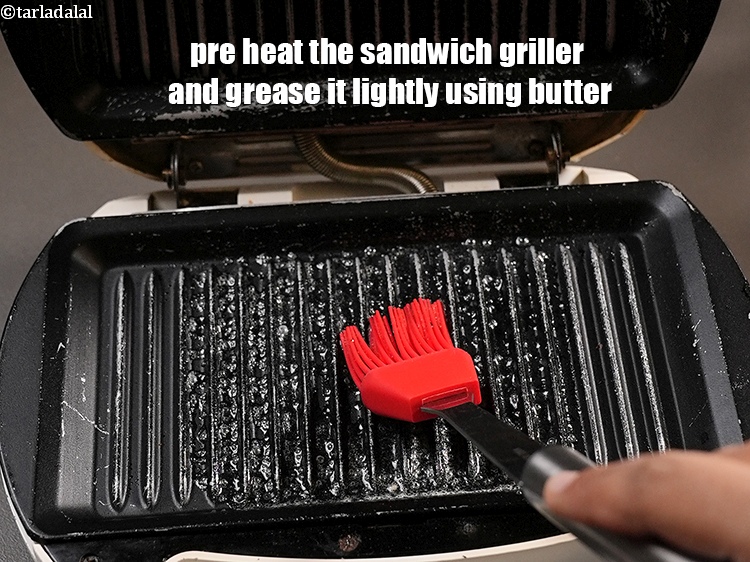 Step 25 – Pre heat the sandwich griller and grease it lightly using &frac12; tsp butter.