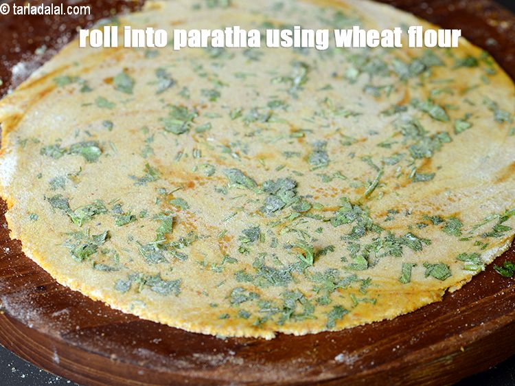 Step 25 – Roll into 7 inch paratha using little whole wheat flour for rolling.