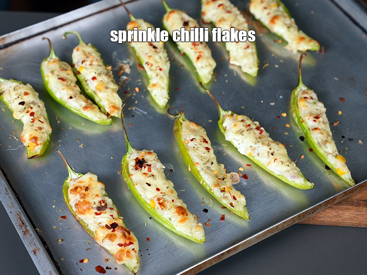 Step 24 – Sprinkle little chilli flakes evenly over it.&nbsp;
