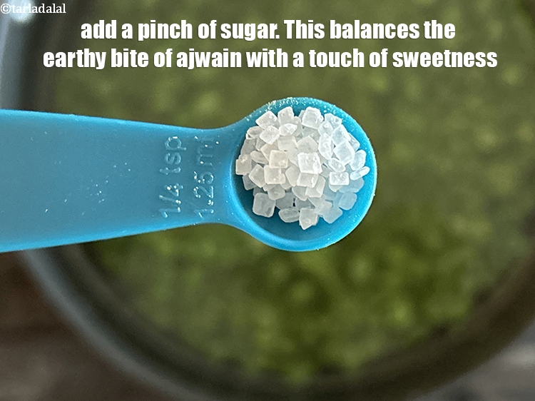 Step 25 – <html><head></head><body><p>Add&nbsp;a pinch&nbsp;<a href="glossary-sugar-chini-shakkar-278i">sugar</a>. Balance the earthy bite of ajwain with a touch of sweetness.</p></body></html>