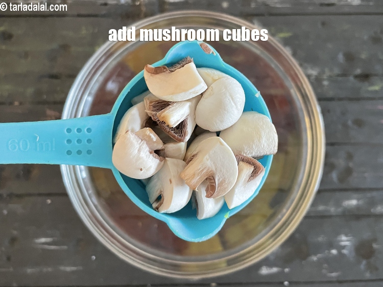 Step 26 – Add&nbsp;<meta charset="UTF-8" />1/2 cup&nbsp;<a href="glossary-mushroom-cubes-2282i">mushroom (khumbh) cubes</a>.