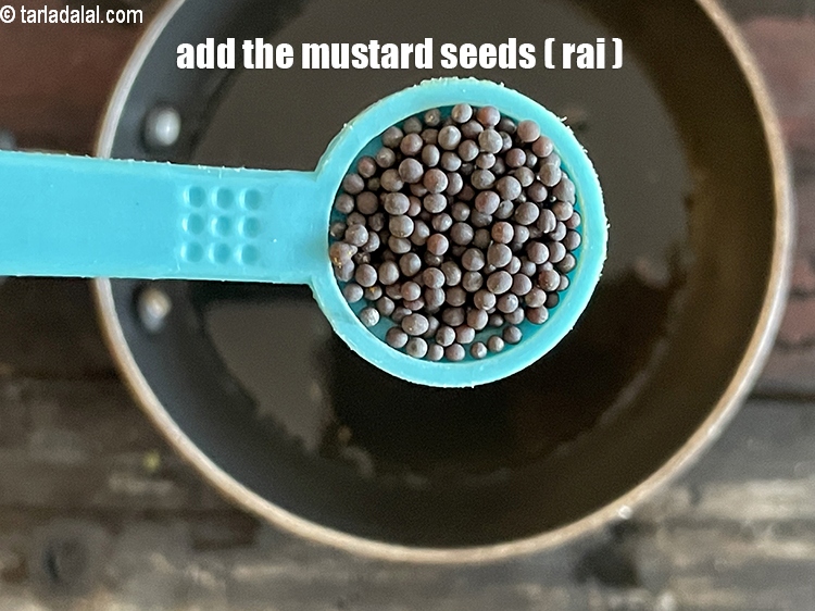 Step 31 – Add&nbsp;<meta charset="UTF-8" />1/2 tsp&nbsp;<a href="glossary-mustard-seeds-sarson-rai-sarson-ke-beej-525i">mustard seeds ( rai / sarson)</a>.