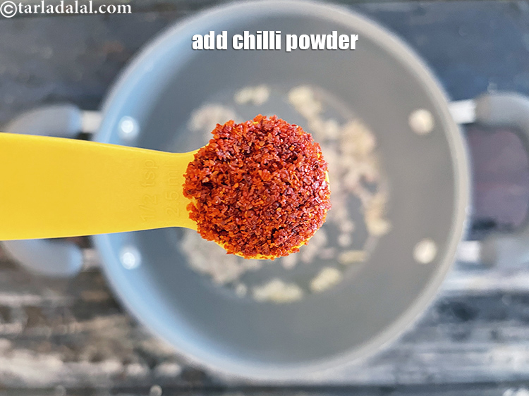 Step 25 – Add&nbsp;<meta charset="UTF-8" />1/2 tsp&nbsp;<a href="glossary-chilli-powder-red-chilli-powder-339i">chilli powder</a>.