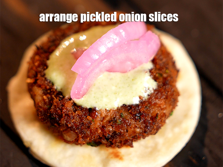 Step 29 – Arrange some pickled onion slices.