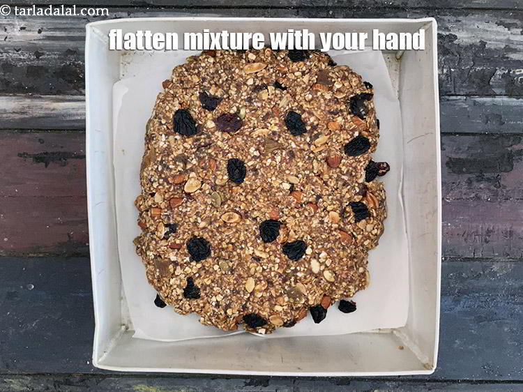 Step 25 – Flatten the mixture with the palm of your hand.