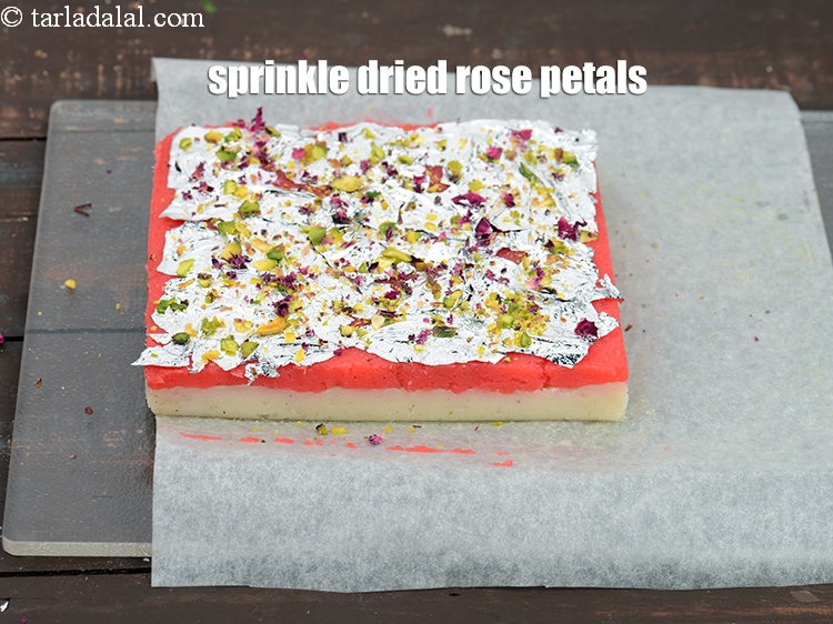 Step 25 – Sprinkle <a href="https://www.tarladalal.com/glossary-dried-rose-petals-2501i">dried rose petals</a>&nbsp;.&nbsp;
