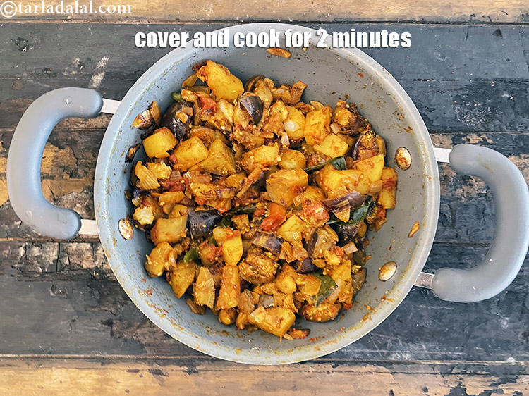 Step 26 – Cover and cook for 2 minutes on a medium flame.<br /> &nbsp;