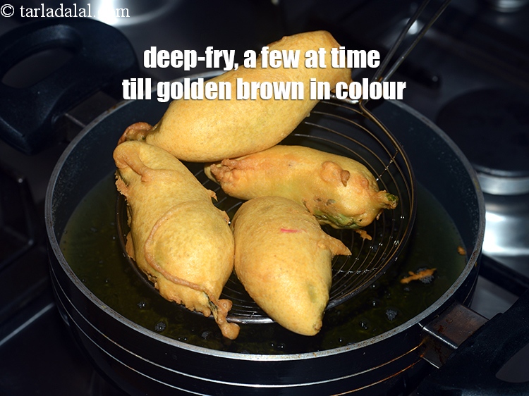 Step 27 – Deep-fry, a few at a time on a medium flame, till they turn golden brown …