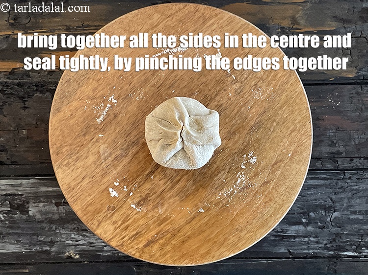 Step 25 – Bring together all the sides in the centre and seal tightly.&nbsp;Pinch the edges together to …