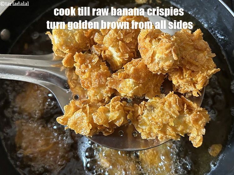 Step 25 – Cook&nbsp;till raw banana crispies turn golden brown in colour from all the sides.