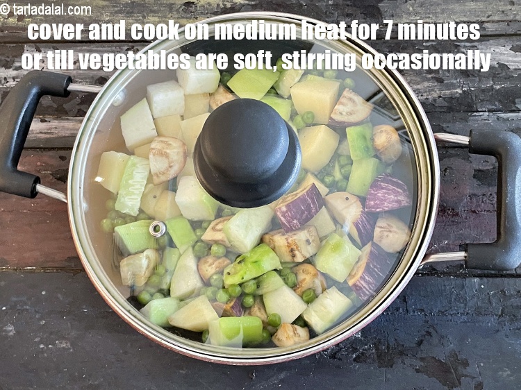 Step 26 – Cover and cook on a medium flame for&nbsp;7 minutes or till the vegetables are soft, …