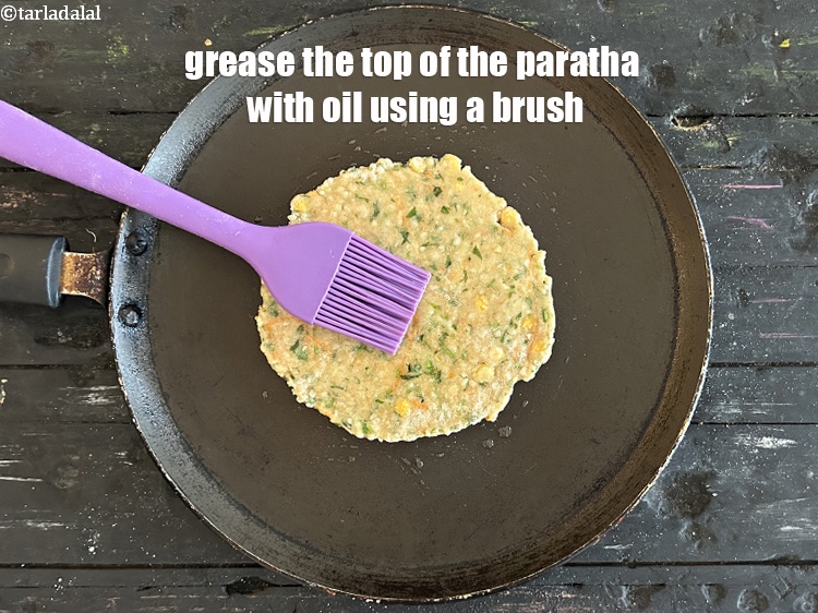 Step 26 – Grease the top with oil using a brush.
