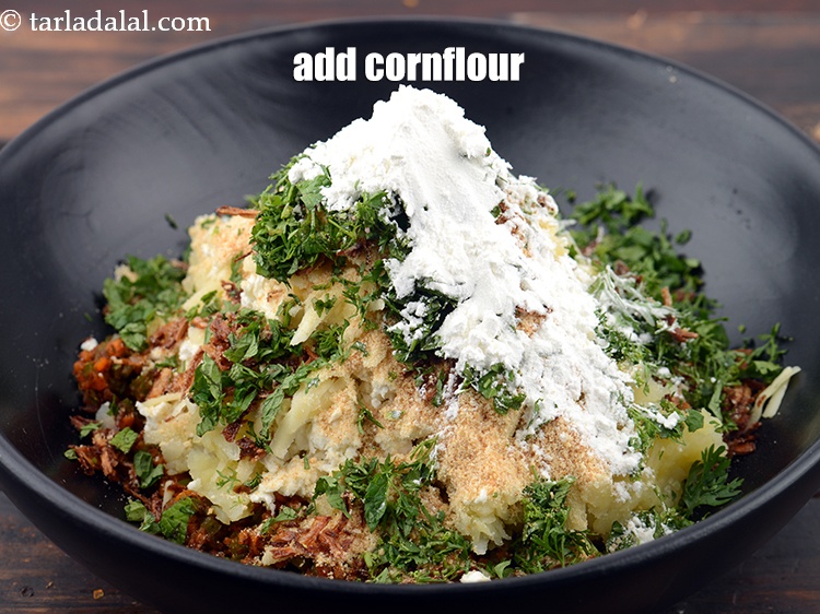 Step 25 – Add 1 tbsp&nbsp;<a href="https://www.tarladalal.com/glossary-cornflour-cornstarch-maize-starch-corn-flour-112i">cornflour</a>.
