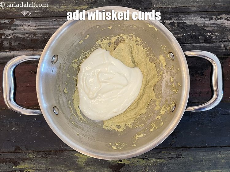 Step 24 – Add&nbsp;<meta charset="UTF-8" />1 cup&nbsp;whisked fresh&nbsp;<a href="glossary-curd-dahi-yogurt-yoghurt-383i">curds (dahi)</a>.