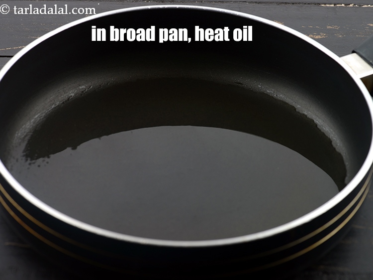 Step 26 – In a broad non stick pan, heat 1 tbsp oil.