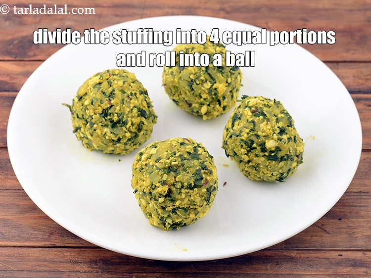 Step 26 – Divide the stuffing into 4 equal portions and roll each portion into a ball. Keep …