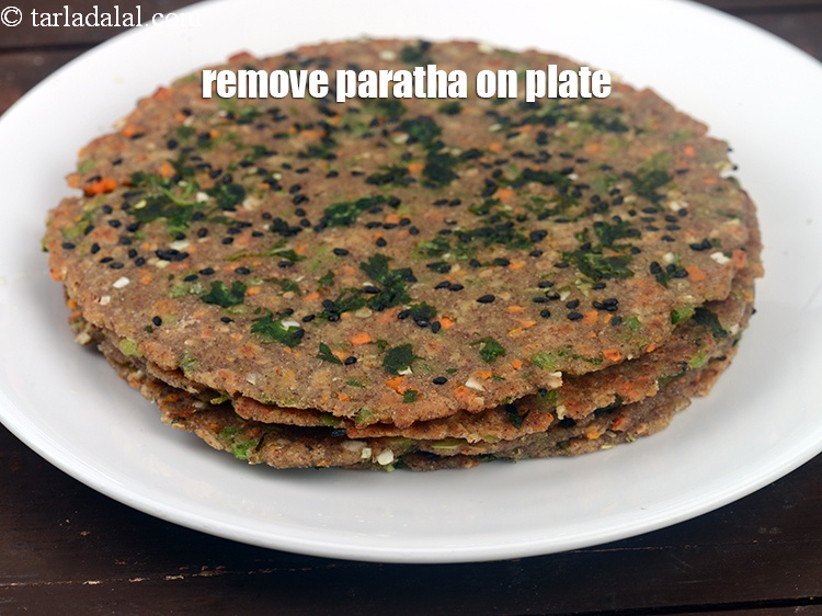Step 25 – Remove the paratha on the plate.