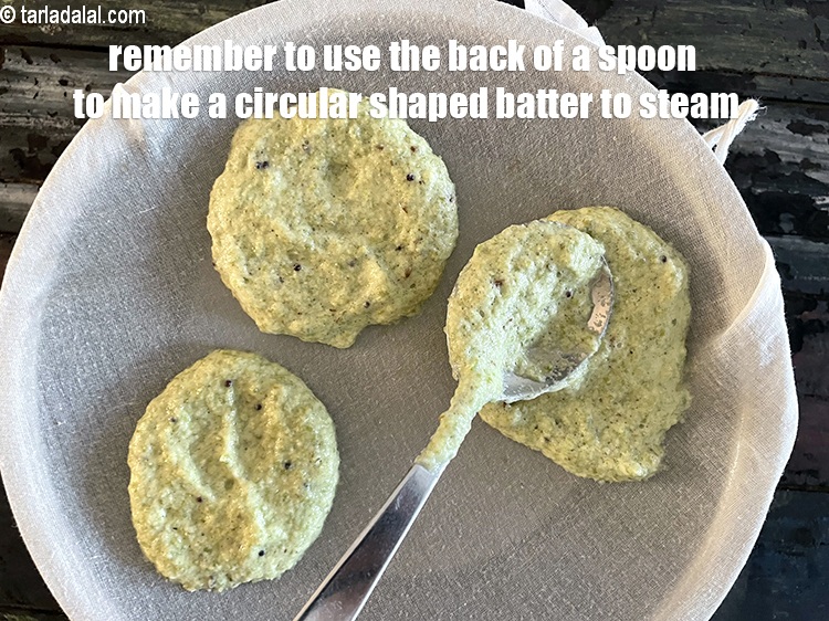 Step 40 – Remember to use the back of a spoon to make a&nbsp;circular&nbsp;shaped batter to steam.