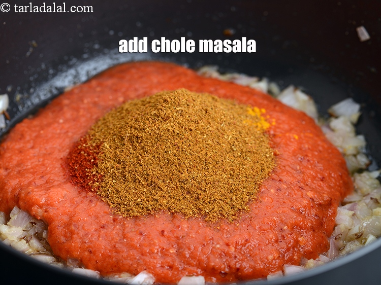Step 26 – Add 2 tsp <a href="https://tarladalal.com/glossary-chole-masala-chana-masala-293i">chole masala</a>.