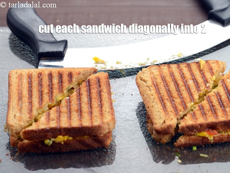Step 25 – Cut each sandwich diagonally into 2 equal pieces.