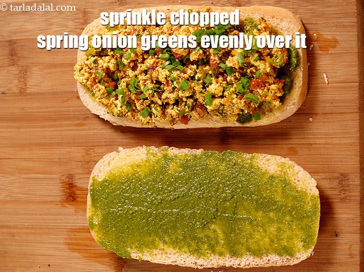 Step 29 – Sprinkle 1 tbsp of <a href="https://www.tarladalal.com/glossary-chopped-spring-onion-greens-1030i">chopped spring onion greens</a> evenly over it.