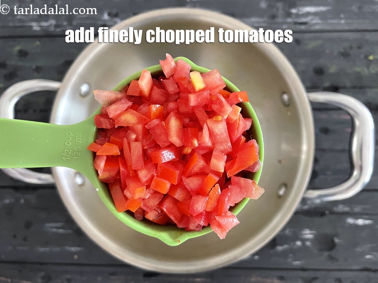 Step 25 – Add&nbsp;<meta charset="UTF-8" />1/2 cup&nbsp;finely&nbsp;<a href="glossary-chopped-tomatoes-779i">chopped tomatoes</a>.