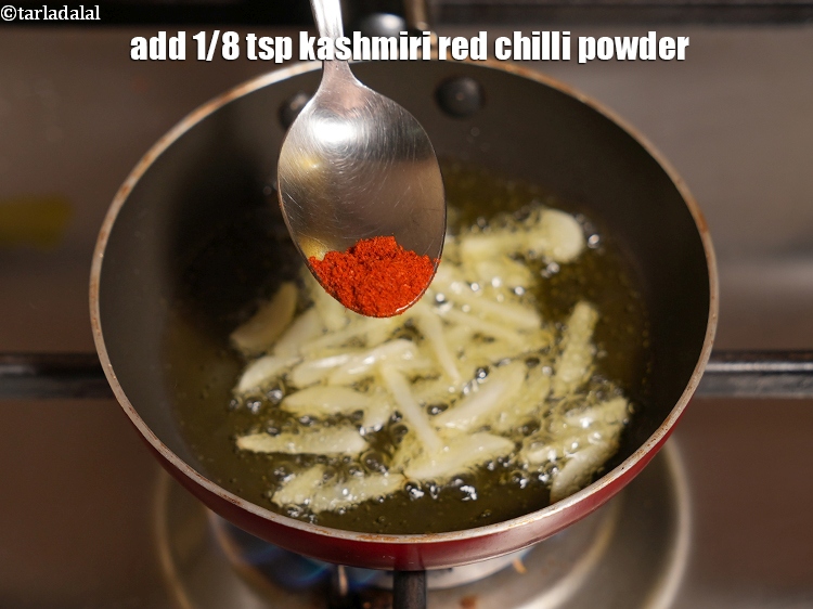 Step 32 – Add&nbsp;1/8 tsp&nbsp;<a href="https://www.tarladalal.com/glossary-kashmiri-red-chilli-powder-kashmiri-mirch-powder-2684i">kashmiri red chilli powder</a>.