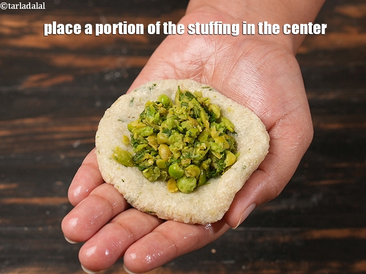 Step 27 – Place a portion of the stuffing in the center.