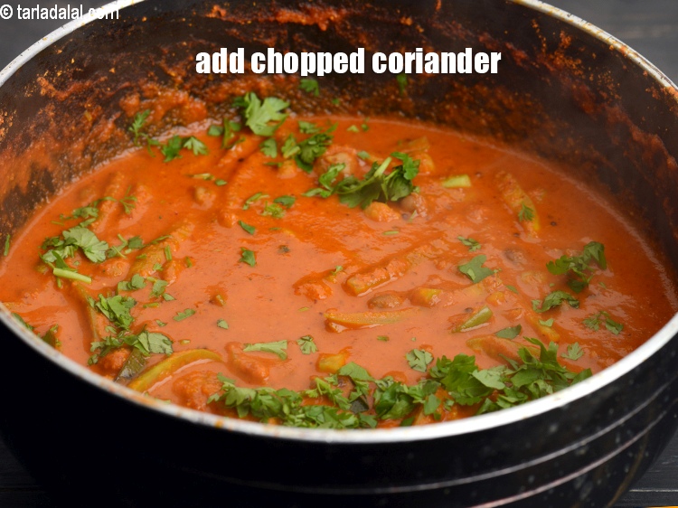 Step 28 – Add 1 tbsp <a href="https://www.tarladalal.com/glossary-chopped-coriander-783i">chopped coriander (dhania)</a>.