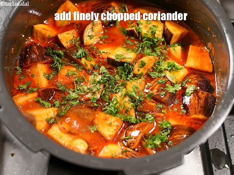 Step 26 – Add 1 tbsp finely&nbsp;<a href="https://www.tarladalal.com/glossary-chopped-coriander-783i">chopped coriander (dhania)</a>.