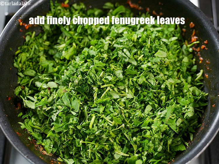 Step 26 – Add 2 cups finely <a href="https://www.tarladalal.com/glossary-chopped-fenugreek-811i">chopped fenugreek leaves (methi)</a>.