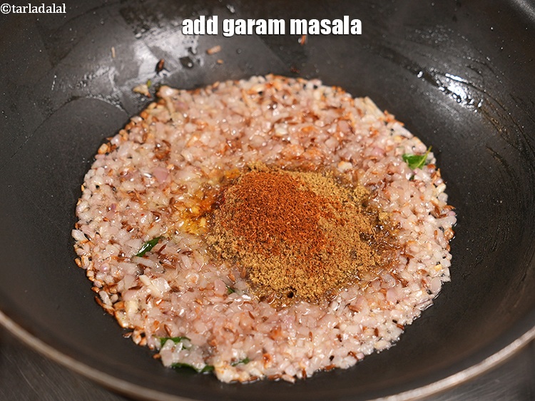 Step 26 – Add &frac14; tsp <a href="https://www.tarladalal.com/glossary-garam-masala-296i">garam masala</a>.