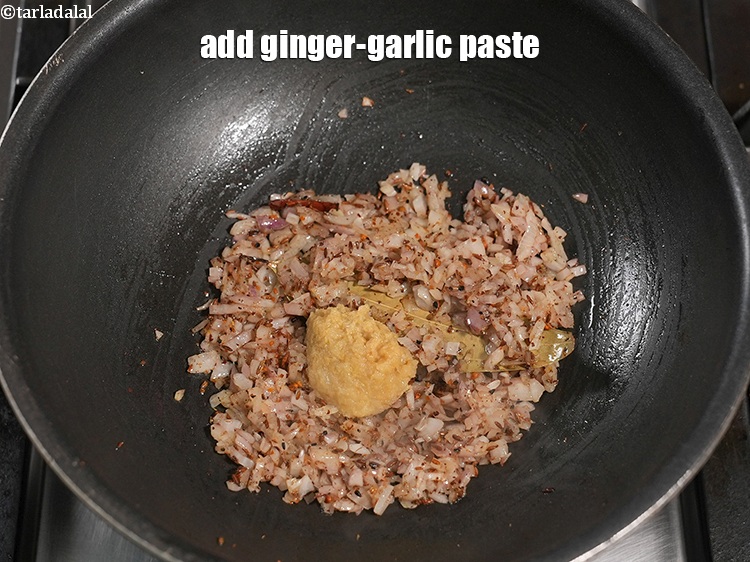 Step 27 – Add 2 tsp <a href="https://www.tarladalal.com/glossary-ginger-garlic-paste-adrak-lehsun-ki-pate-adrak-lahsun-ki-paste-939i">ginger-garlic (adrak-lehsun) paste</a>.
