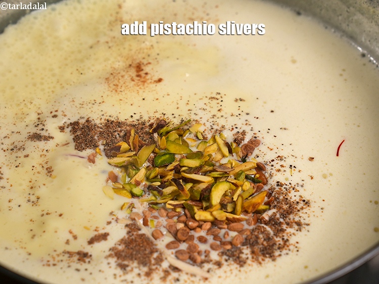Step 26 – Add 1 tbsp&nbsp;<a href="https://www.tarladalal.com/glossary-pistachio-slivers-894i">pistachio slivers</a>.