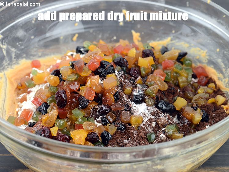 Step 26 – Add the soaked dry fruit mixture. Keep little soaked dry fruit mixture aside for topping …
