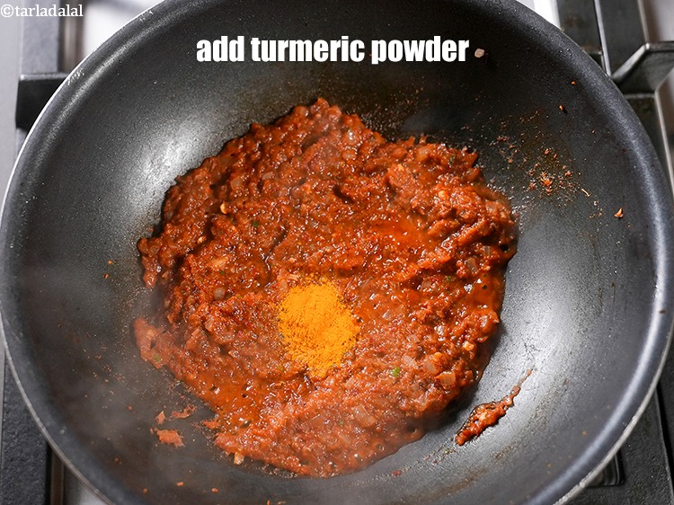 Step 26 – Add &frac14; tsp <a href="https://www.tarladalal.com/glossary-turmeric-powder-haldi-645i">turmeric powder (haldi)</a>.&nbsp;