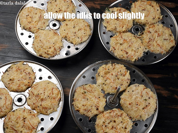 Step 31 – Allow the idlis to cool slightly.&nbsp;