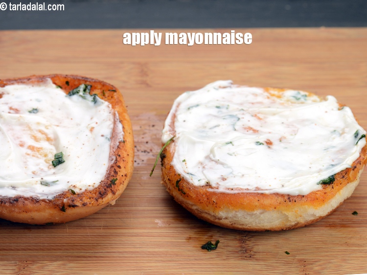 Step 26 – Apply &frac12; tbsp <a href="https://www.tarladalal.com/glossary-mayonnaise-505i">mayonnaise</a>.