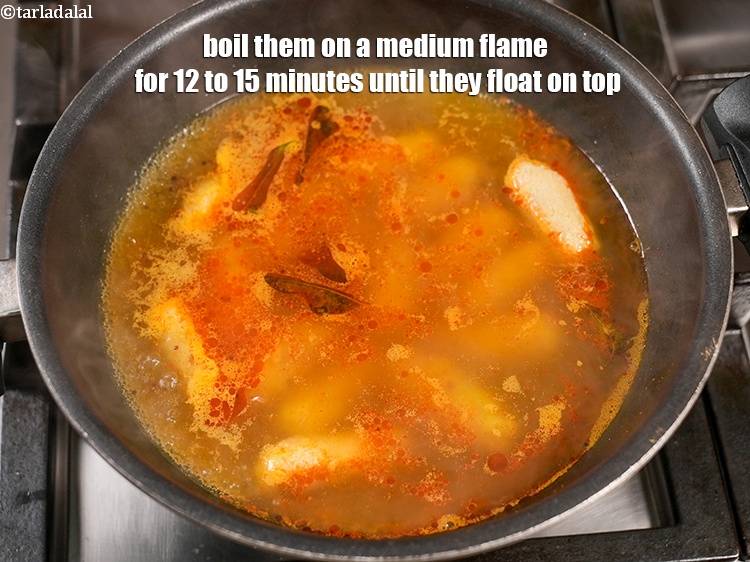 Step 26 – Boil them on a medium flame for 12 to 15 minutes until they float on …