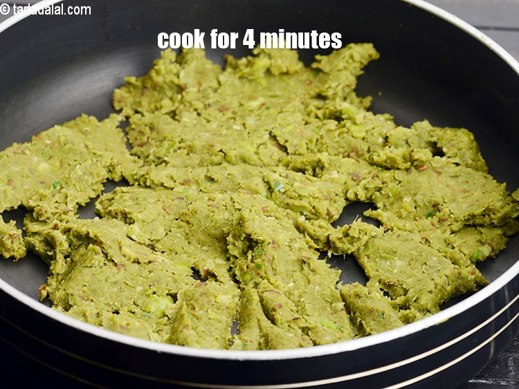 Step 27 – Mix well. Cook on a medium flame for 4 minutes, till the mixture becomes dry, …