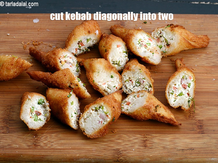 Step 26 – Cut each kebab diagonally into two.
