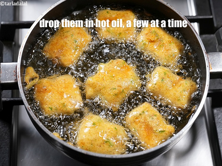 Step 26 – Drop them in hot oil, a few at a time.