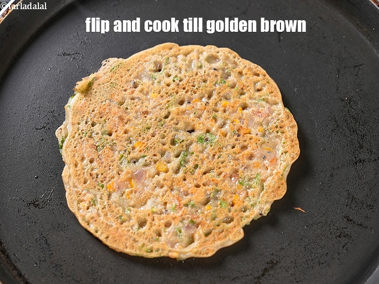 Step 26 – Flip and cook till golden brown.