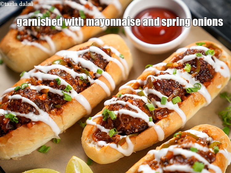 Step 31 – Garnished with mayonnaise and spring onions.