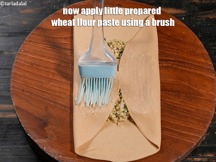 Step 26 – Now apply little prepared wheat flour paste using a brush.&nbsp;