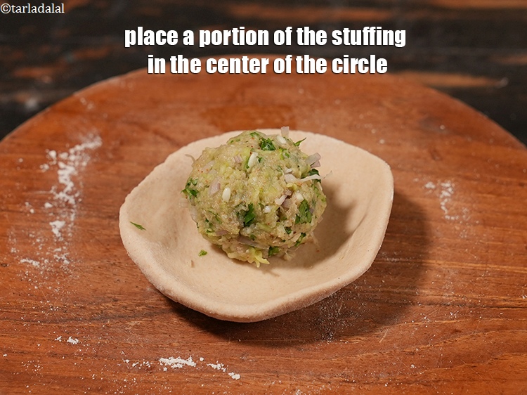 Step 26 – Place a portion of the stuffing in the center of the circle.