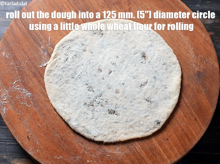 Step 27 – Roll out the dough into a 125 mm. (5&quot;) diameter circle using a little whole …